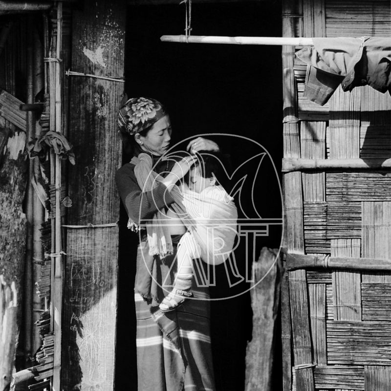 "Apa Tani woman and baby Reru Village Arunachal Pradesh, 2000"