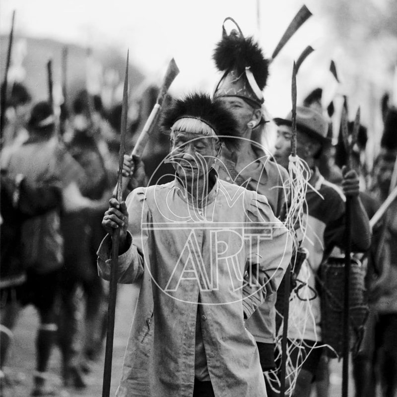"A ceremonial march by Konyak men  Aoling Spring Festival Longwa Village Nagaland, 2001"