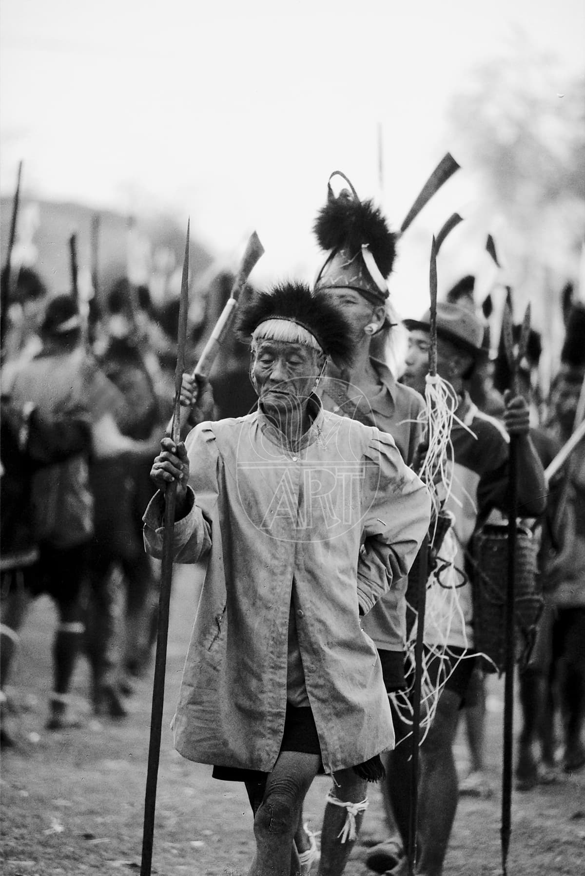 "A ceremonial march by Konyak men  Aoling Spring Festival Longwa Village Nagaland, 2001"
